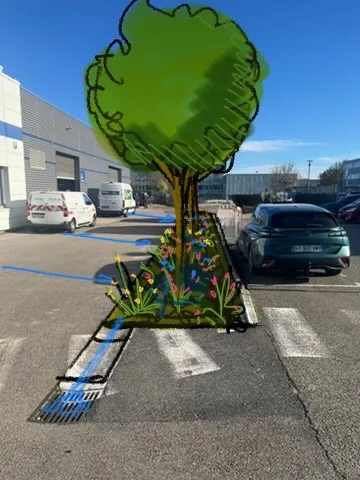 Le plus grand point du projet : une noue centrale qui traverse le parking, alimentée par 443 m² de surfaces.